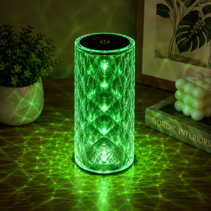 Crystal Rose LED table lamp glowing green with crystal light reflections