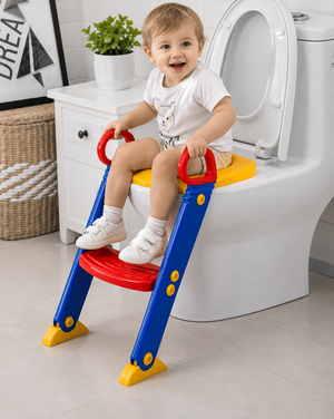 Child using toddler toilet ladder with red handles and blue frame